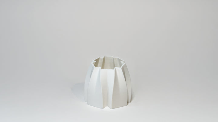 Flake Series Small Planter by OBJ STUDIO, architectural-inspired minimalist form, 3D-printed with PLA for design-forward homes.
