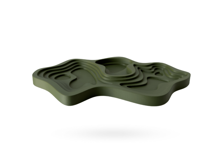 Architectural-inspired Topo Tray by OBJ STUDIO, 3D-printed in olive green with layered topographic form for design-forward décor.