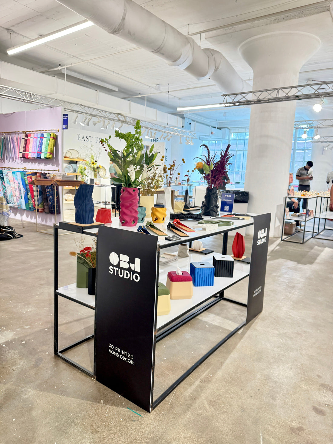 OBJ STUDIO booth at Shoppe Object New York featuring colorful 3D-printed home decor, vases, planters, organizers, and sculptural objects designed in Toronto, Canada.