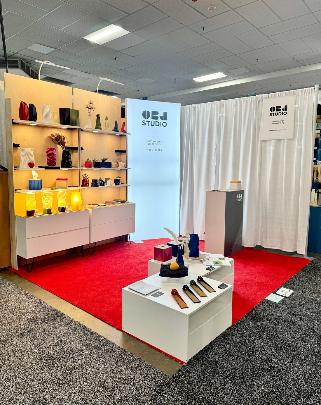 OBJ STUDIO booth at Toronto Market Week featuring colorful 3D-printed home decor, sculptural vases, planters, organizers, and lighting designed and made in Toronto, Canada.