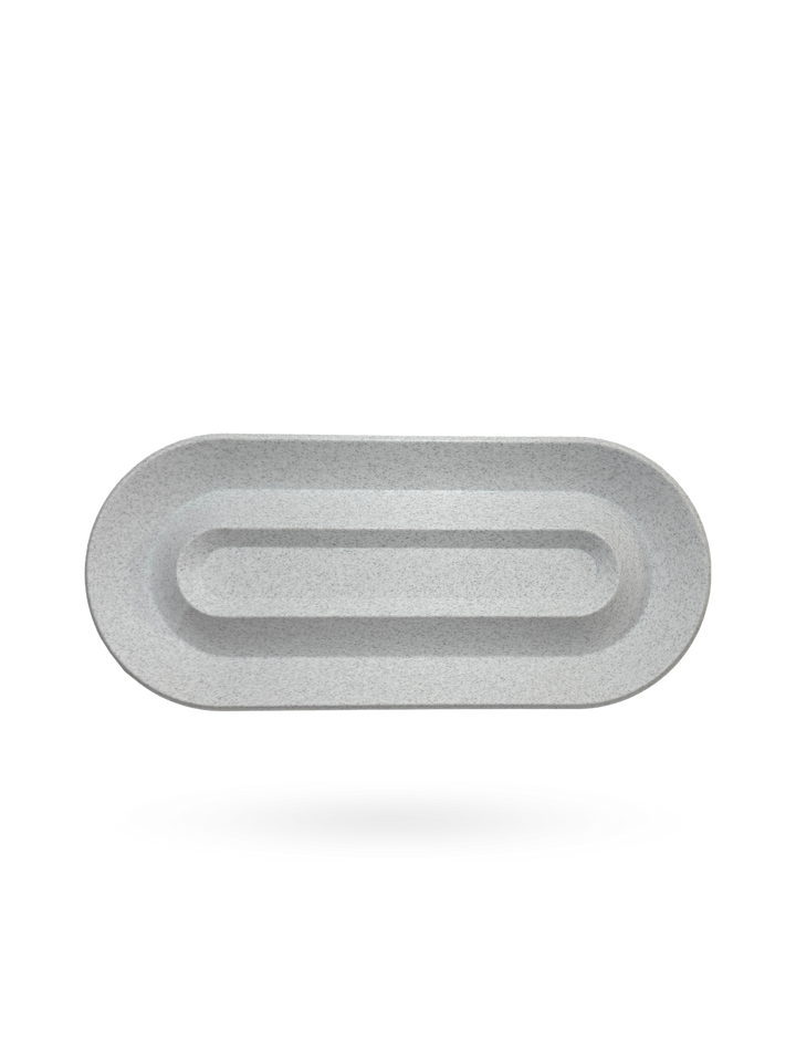 Eco-friendly 3D-printed tray with soft curves and a minimalist design, inspired by natural paths. The Nook Tray, size 10 ¾ x 4 ¾ x 1 inches, blends functionality with sustainable decor, ideal for organizing everyday items.