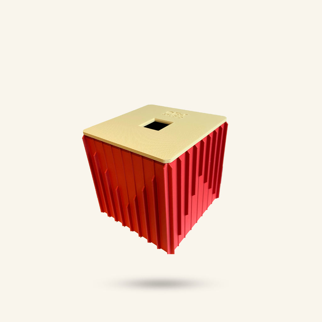Red and gold rectangular container on a white background