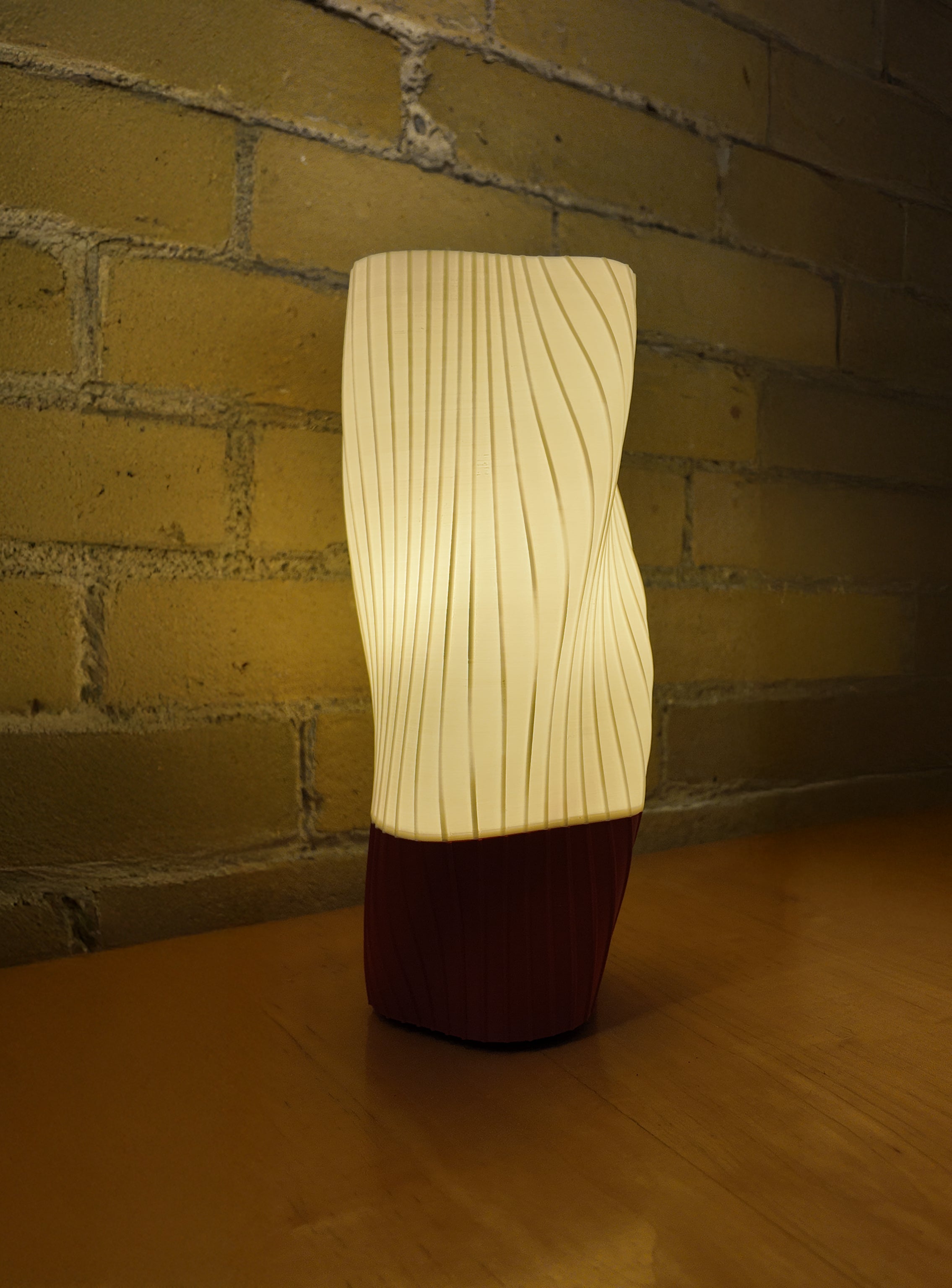 Fluid Series lighting shade illuminated, sustainable 3D printed lamp made from plant-based PLA and designed in Toronto