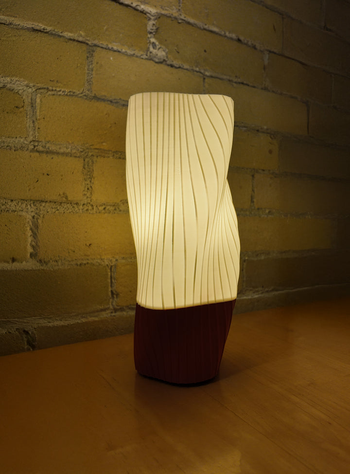 Fluid Series lighting shade illuminated, sustainable 3D printed lamp made from plant-based PLA and designed in Toronto