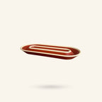 OBJ STUDIO Nook Tray in a 2-tone terracotta and cream plant-based PLA, featuring a curved, minimalist design.
