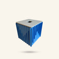 OBJ STUDIO Strata square tissue box cover in blue with a grey top, featuring a modern ribbed architectural design.