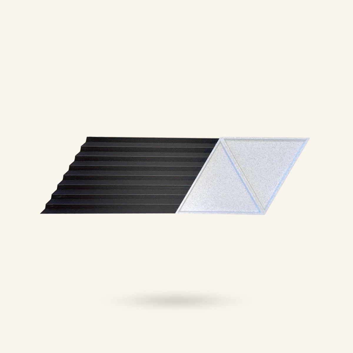 OBJ STUDIO Z-Organizer in black and white 3D-printed plant-based PLA with a linear and triangular geometric design.